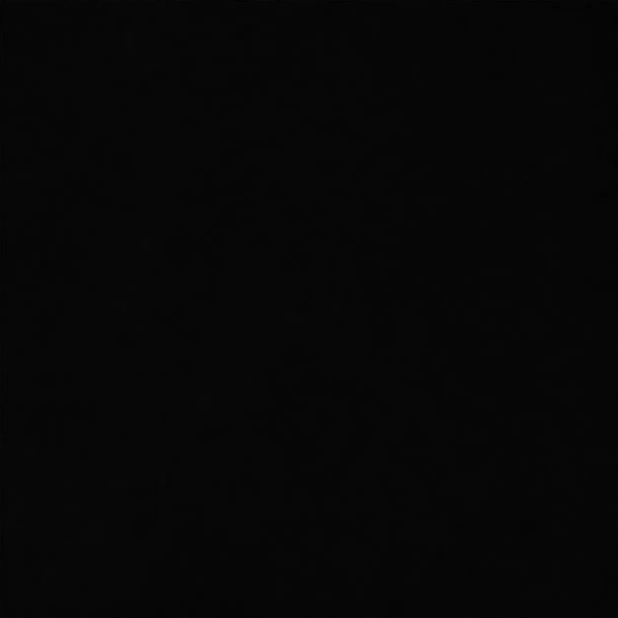 Sinterium Negro Puro — muestra de superficie sinterizada